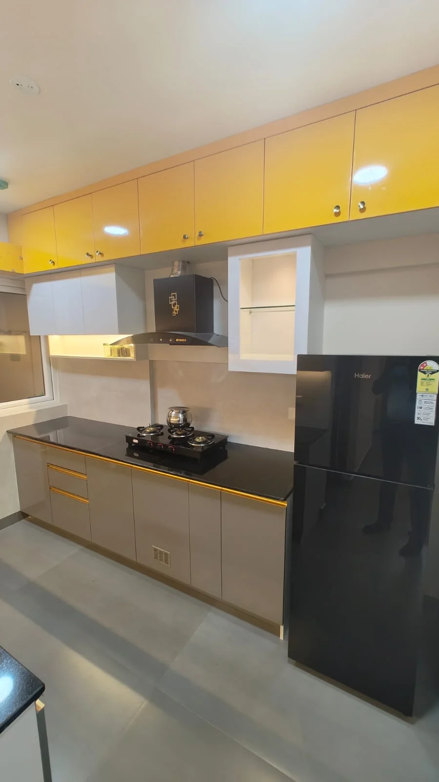 Modular kitchen interior design by Gambitz Designs, Kerala
